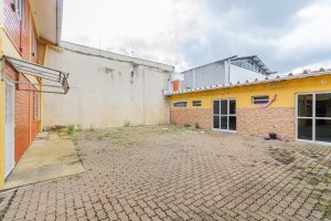 Casa com 360m², 7 dormitórios no bairro Anchieta em Porto Alegre para Alugar