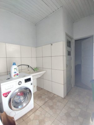 Casa com 209m², 4 dormitórios no bairro Auxiliadora em Porto Alegre para Comprar