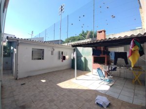 Casa com 209m², 4 dormitórios no bairro Auxiliadora em Porto Alegre para Comprar