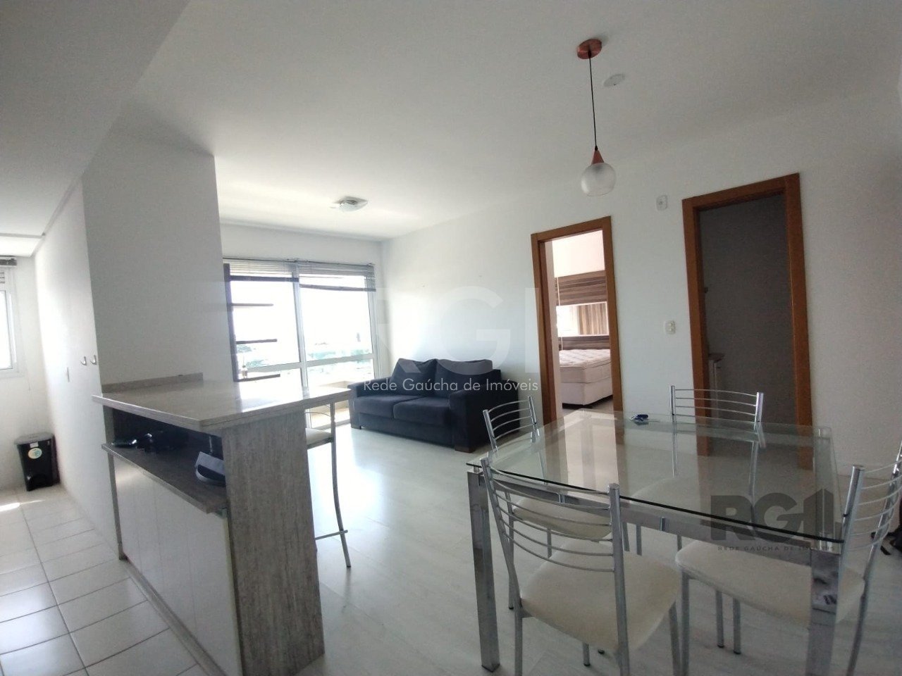 Apartamento com 57m², 1 dormitório, 1 suíte, 1 vaga no bairro Três Figueiras em Porto Alegre para Comprar