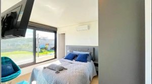 Casa com 340m², 4 dormitórios no bairro Vila Nova em Porto Alegre para Alugar