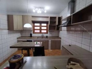 Casa com 420m², 4 dormitórios no bairro Medianeira em Porto Alegre para Alugar